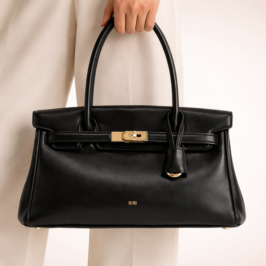 Elegant skuldertaske til kvinder i blødt syntetisk læder med struktureret design