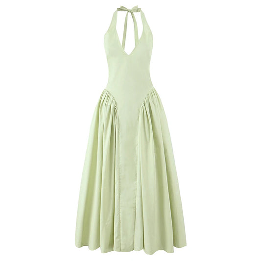 Halter midi kjole – Dyb V-udskæring | Åben ryg | Lav talje | A-line skørt | Elegant til events