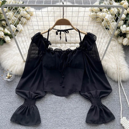 Elegant halterbluse | Sløjfedetalje og flare-ærmer