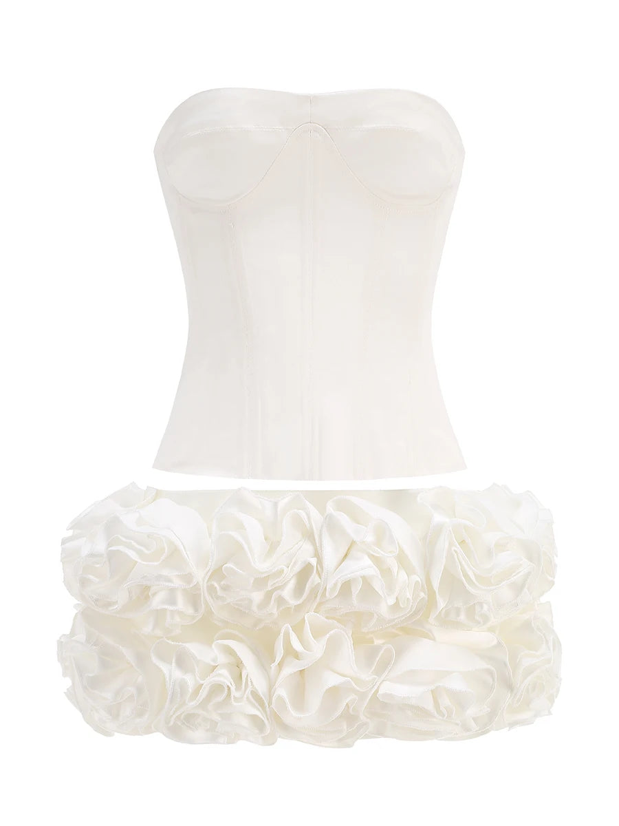 Stropløst to-delt festsæt | Skulpturel top | Blomsterfoldet mininederdel