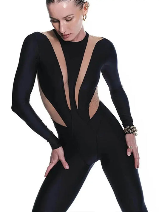 Figursyet jumpsuit med lange ærmer og transparente detaljer