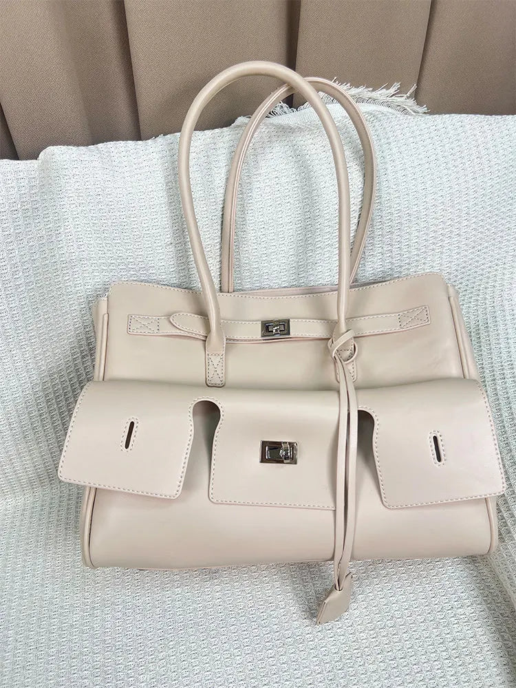 Elegant Struktureret Tote Taske Med Låsedetalje Og Rummeligt Design