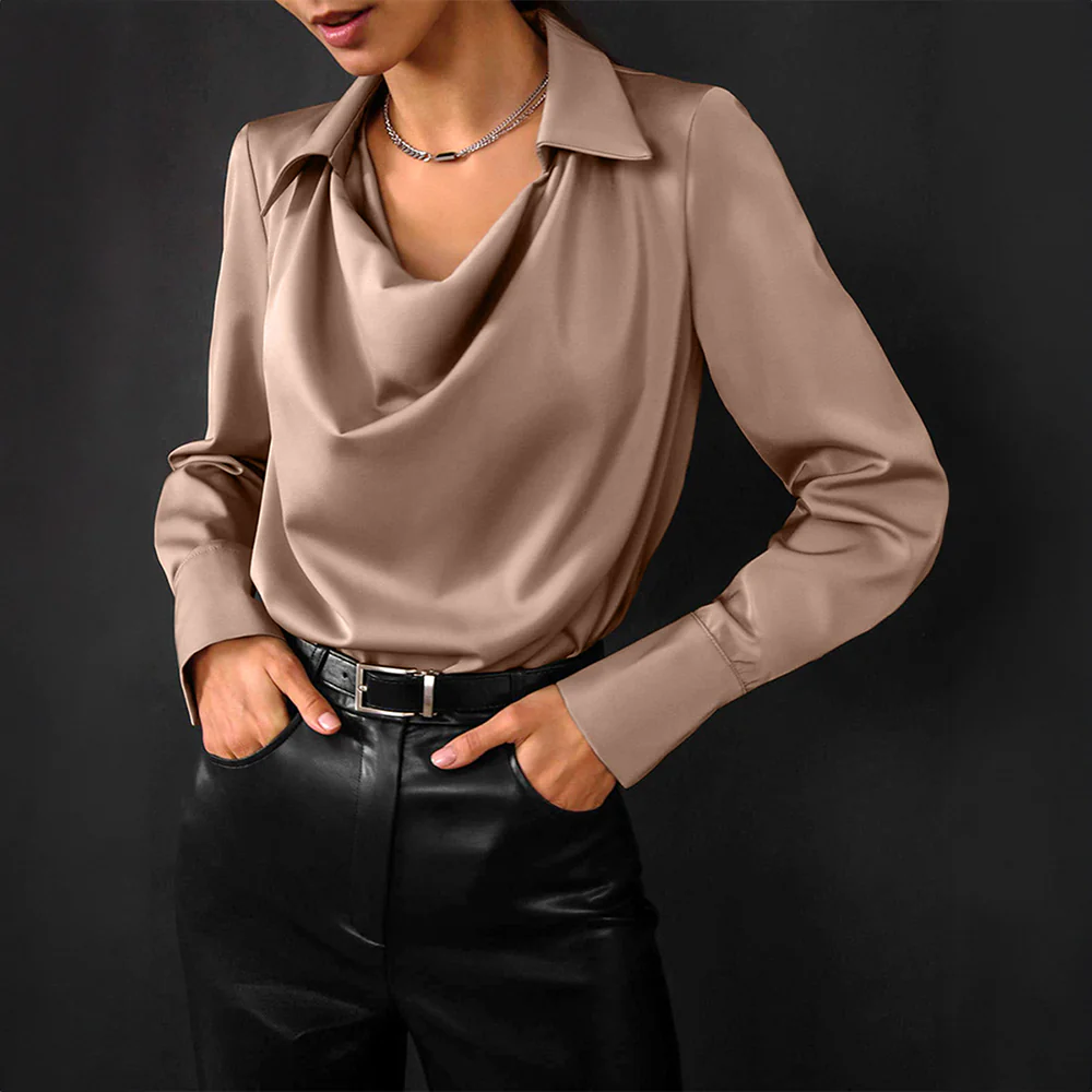 Elegant bluse med fine detaljer og klassisk pasform til kvinder