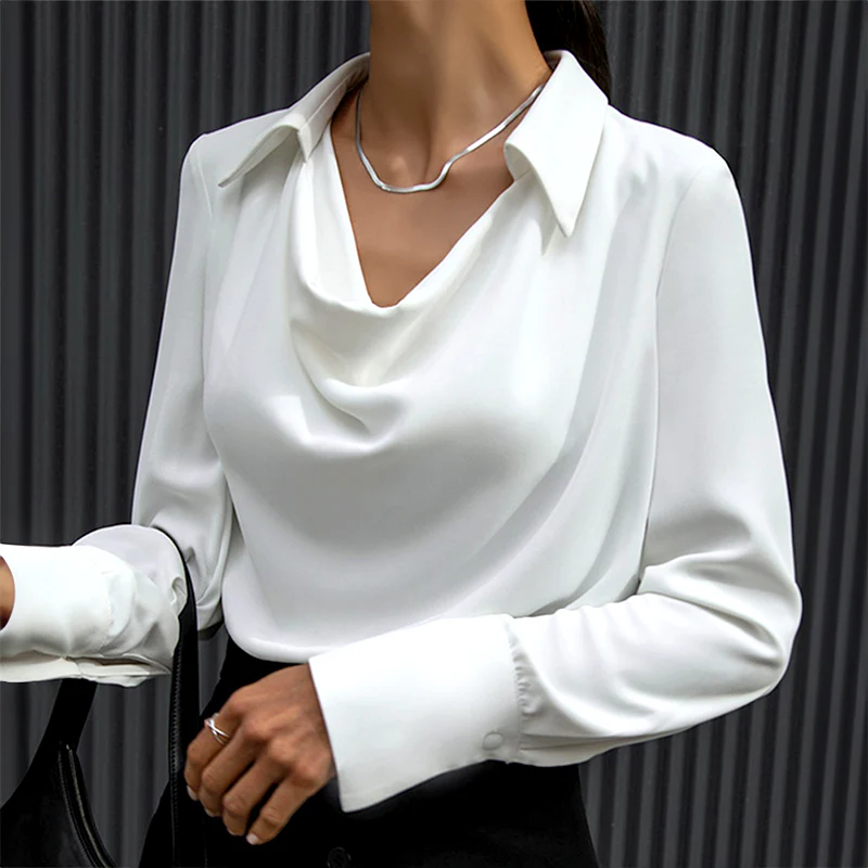 Elegant bluse med fine detaljer og klassisk pasform til kvinder