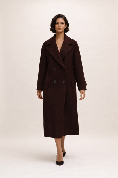 Elegant lang frakke med klassisk snit og stilren silhuet