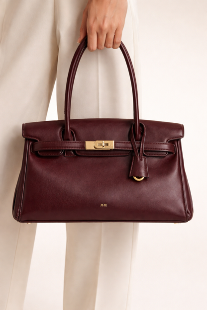 Elegant skuldertaske til kvinder i blødt syntetisk læder med struktureret design