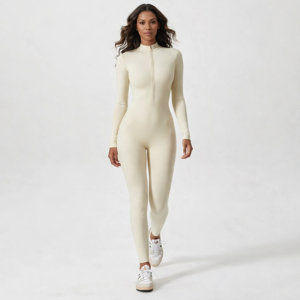 Figurformende træningsdragt i ét stykke med lange ærmer og lynlås til kvinder
