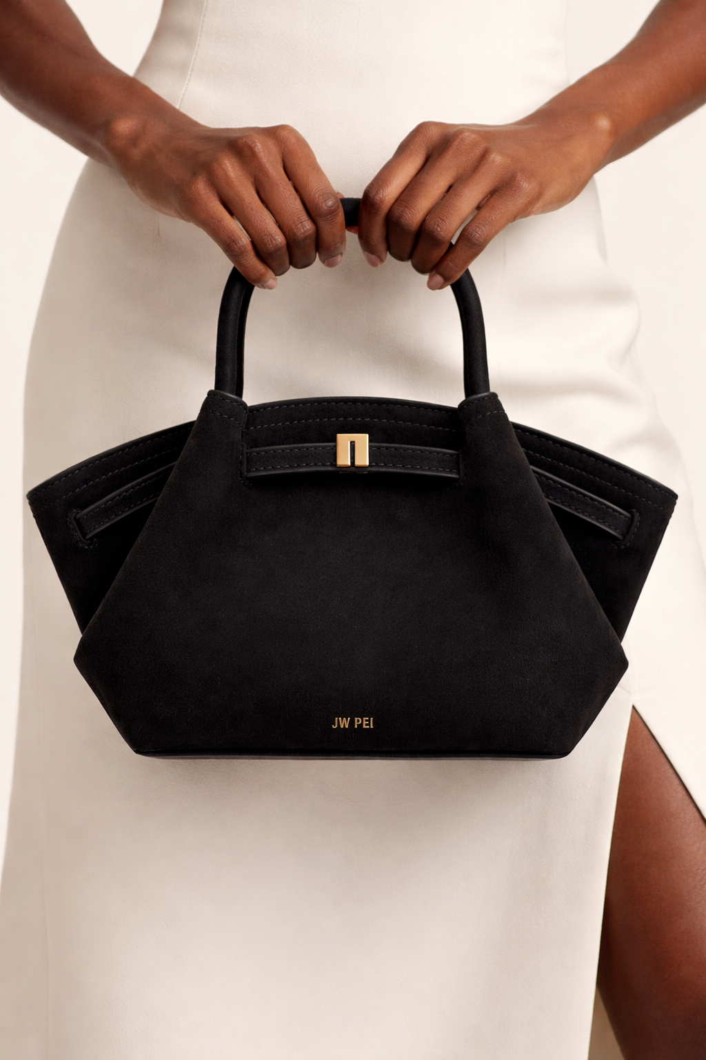 Mini skuldertaske til kvinder | Struktureret design | Ruskind | Kompakt format