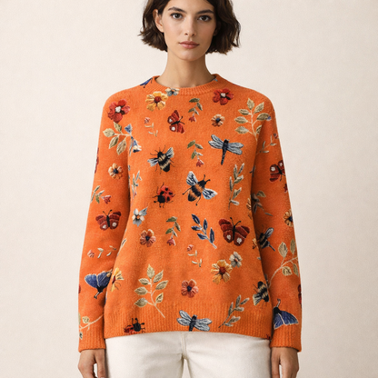 Strikket pullover til kvinder med dekorativt blomster- og insektprint