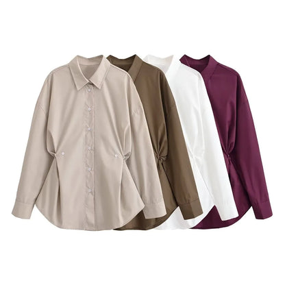 Elegant langærmet skjorte med justerbar talje og afslappet silhuet