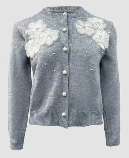 Elegant strikket cardigan til kvinder med dekorative blomsterdetaljer