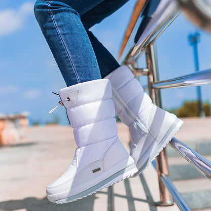 Forede mellemhøje støvler til kvinder med vandafvisende overflade og platformsål