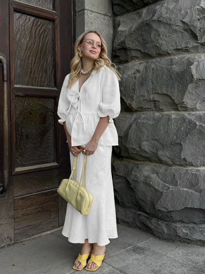 Elegant todelt sæt i bomuld med V-udskæring og lang nederdel