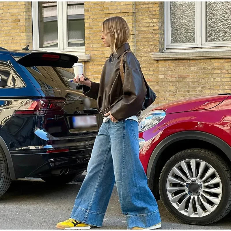 Vintage bomberjakke i imiteret læder | Lynlås og bælte