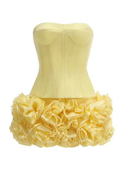 Stropløst to-delt fest­sæt | Skulpturel top | Blomsterfoldet mininederdel