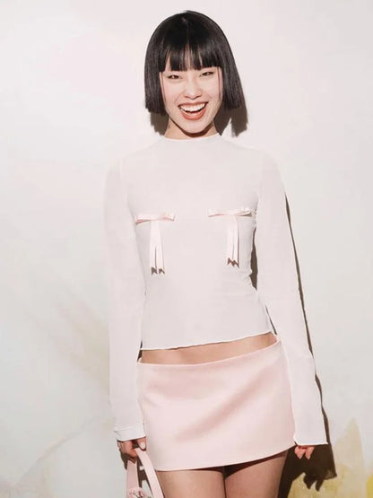 Kvinders tætsiddende langærmet top | Slankt snit | Sløjfedetaljer