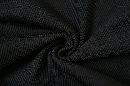 2-delt sæt med top og shorts - Ribbet stretch | Kontrastkant | Knaplukning foran | Ærmeløs, figurnær pasform