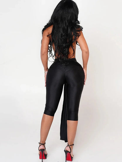 Patchwork-playsuit med halterneck | Elegant og figursyet design