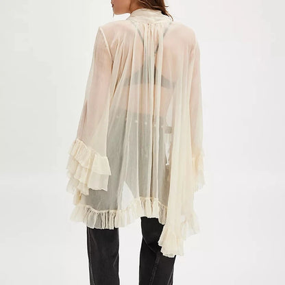 Elegant dameskjorte med flæsekant | Løs pasform | Sløjfedetalje og let transparent look