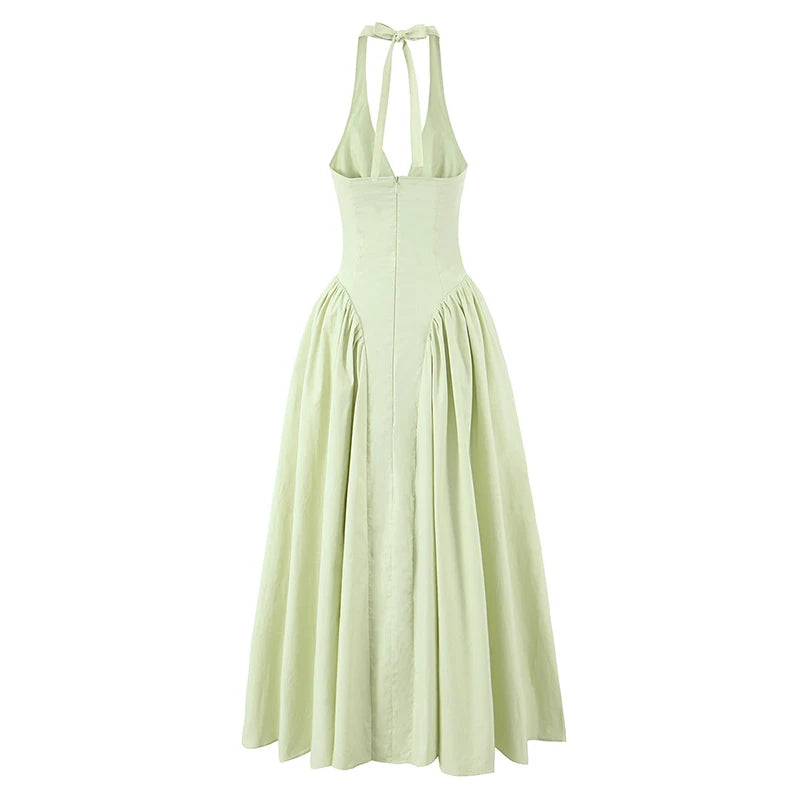 Halter midi kjole – Dyb V-udskæring | Åben ryg | Lav talje | A-line skørt | Elegant til events