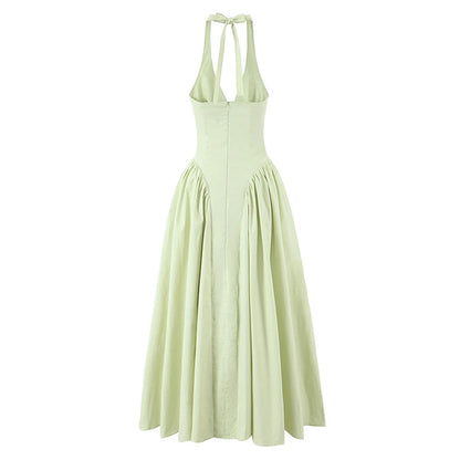 Halter midi kjole – Dyb V-udskæring | Åben ryg | Lav talje | A-line skørt | Elegant til events