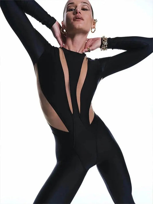 Figursyet jumpsuit med lange ærmer og transparente detaljer