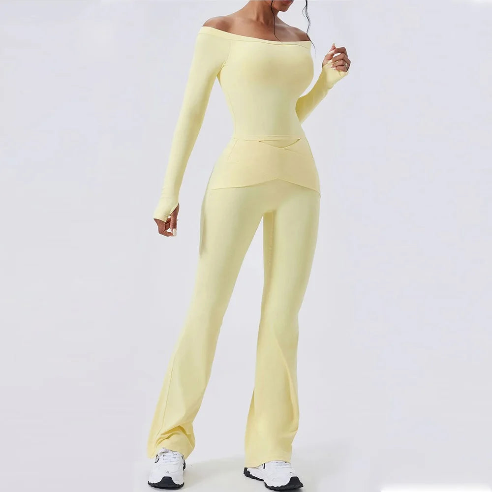 Elegant yoga- og træningssæt til kvinder med langærmet top og flatterende bukser