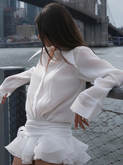 Elegant sort skjorte med taljedetalje | Langærmet bluse med slå-om effekt