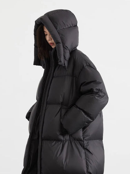 Lang quiltet dunkjakke til kvinder | Varm letvægtskonstruktion | Praktisk hættedesign