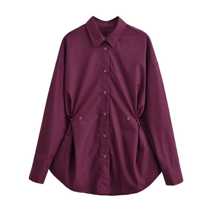 Elegant langærmet skjorte med justerbar talje og afslappet silhuet