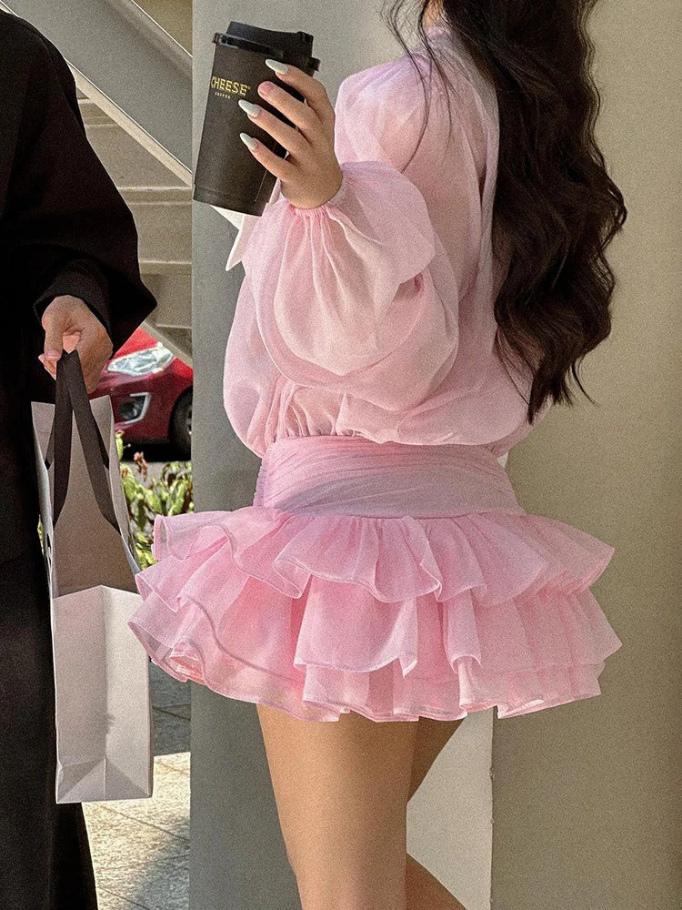 Elegant sort skjorte med taljedetalje | Langærmet bluse med slå-om effekt