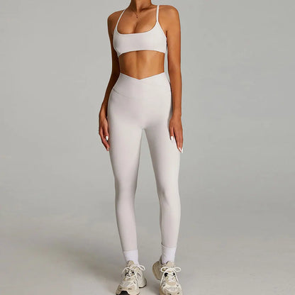 Figurformende yogasæt med støttende sports-bh og højtaljede leggings til kvinder