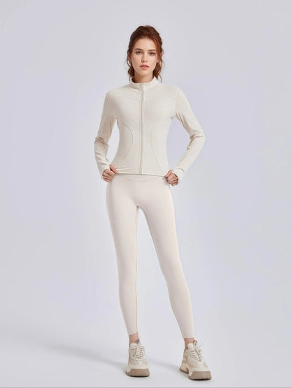 Kvinders todelt træningssæt | Lynlåsjakke med høj hals og højtaljede leggings
