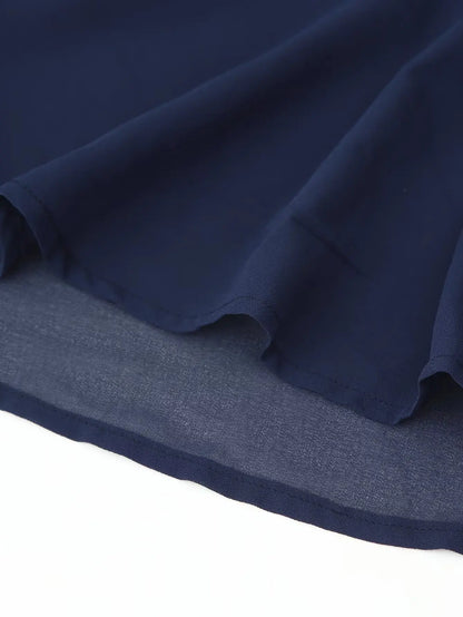 Kjole med farveblok og rygløs design til kvinder | A-formet festkjole